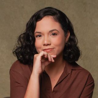 Dra. Vine  Oliveira Philadelpho