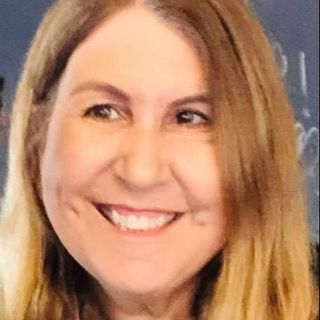 Dra. Andréa Arlotta