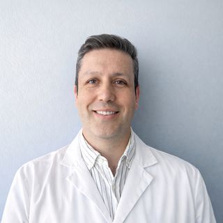 Dr. Claudio Arriagada Cancino