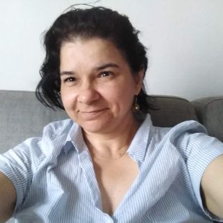 Dra. Romy Schneider Carvalho