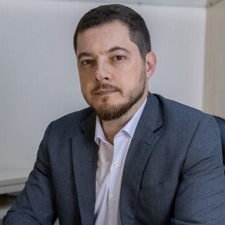 DR. CASSIUS FRIGULHA
